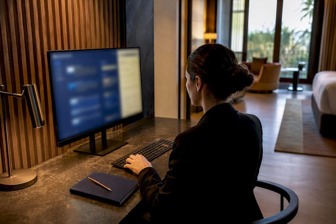 Coordinator monitoring automated hotel bookings